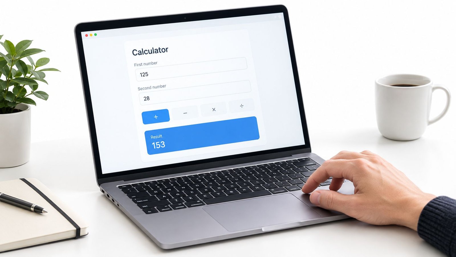 A person using a laptop to calculate numbers with an online calculator interface on the screen.